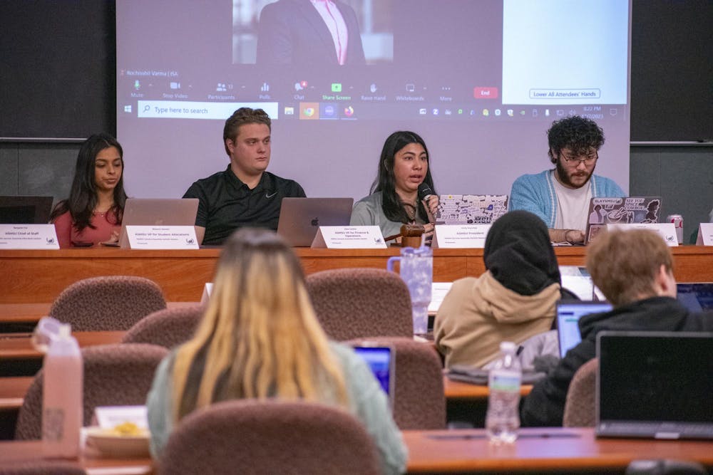 <p>President Emily Hoyumpa calls for a vote during ASMSU's General Assembly meeting on Dec. 7, 2023 at the International Center.</p>