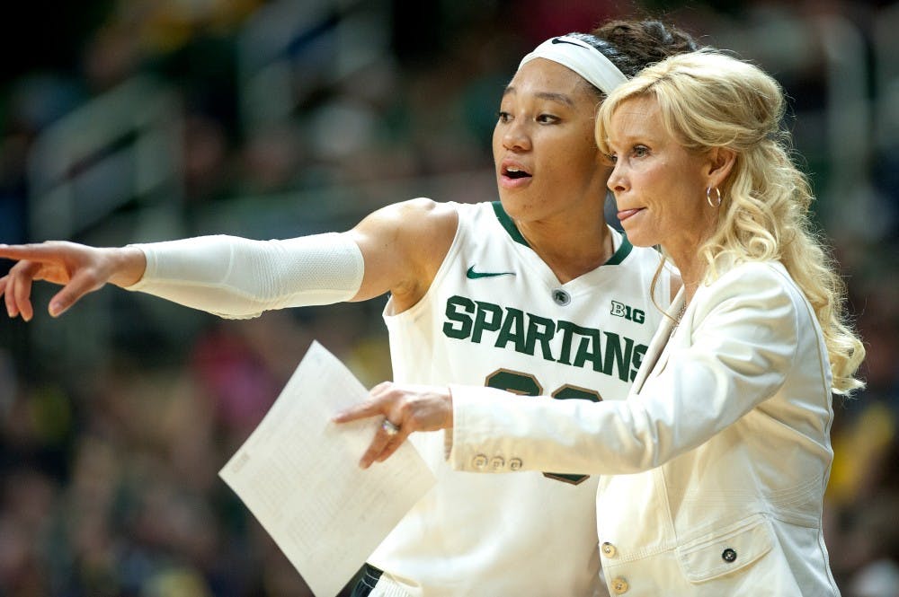 Junior forward Aerial Powers talks to head coach Suzy Merchant during the game against Michigan on Feb. 3, 2016 at Breslin Center. The Spartans defeated the Wolverines, 85-64.