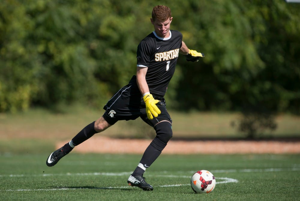 <p>Then-sophomore goal keeper Zach Bennett, 1, kicks the ball during the game against Northern Illinois on Sept. 28, 2013, at DeMartin Stadium at Old College Field. The Spartans defeated the Huskies, 2-0. Julia Nagy/The State News</p>