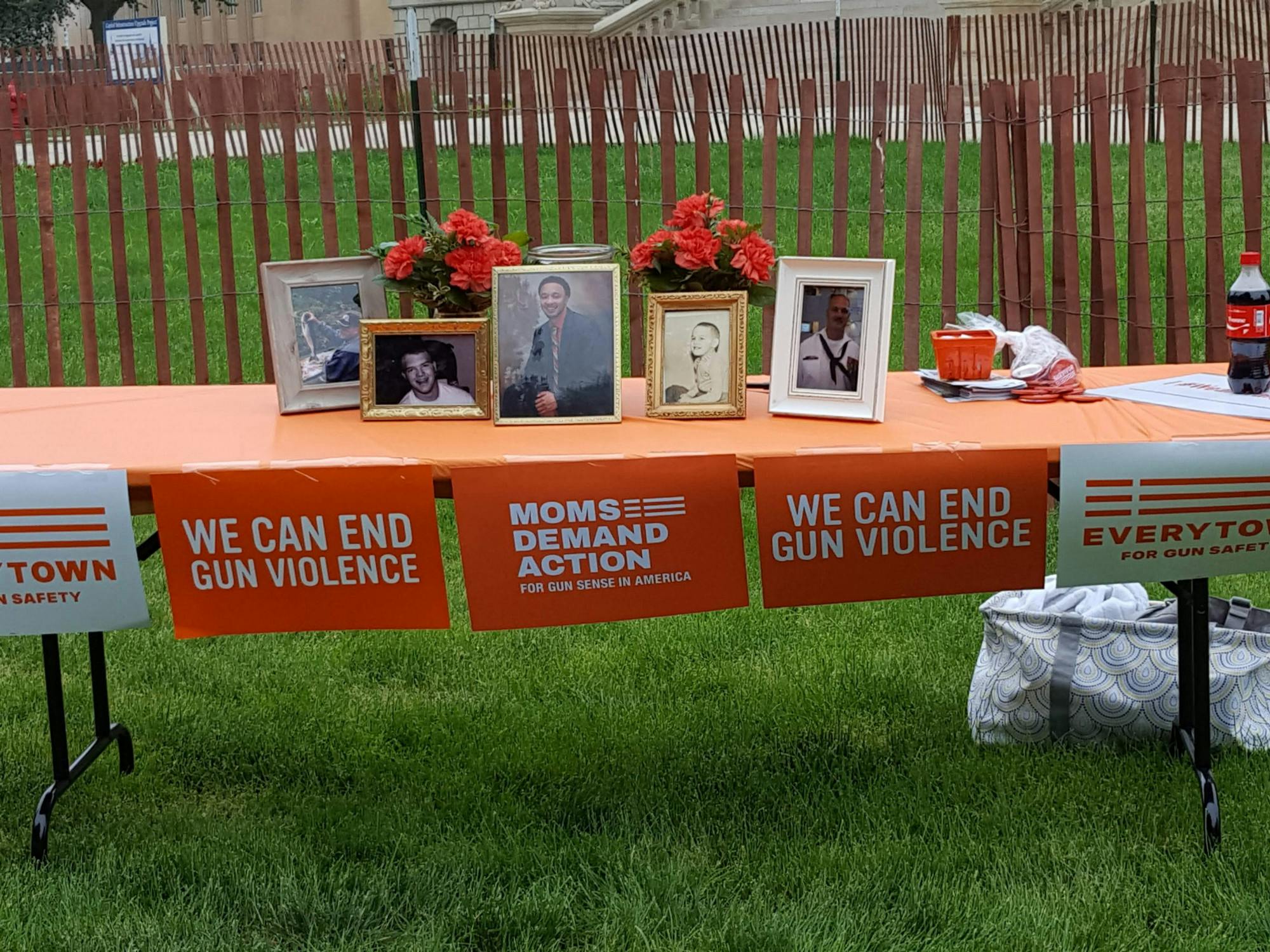 <p>A memorial table to local victims of gun violence from the 2018 Wear Orange event. Photo courtesy of .. </p>