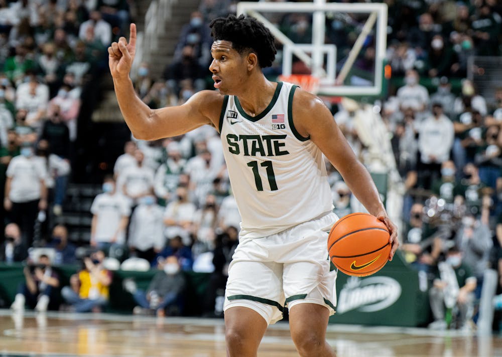 <p>Sophomore guard AJ Hoggard calls a play during the Spartans&#x27; 71-69 win against Minnesota on Jan. 12, 2022.</p>