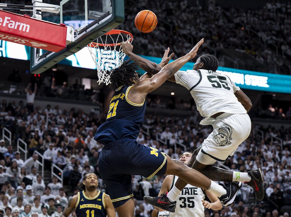 <p>MSU junior forward Coen Carr (55) and UM sophomore forward Morez Johnson Jr. (21) jump for the ball&nbsp;at the Breslin Student Events Center on Jan. 30, 2026. </p>