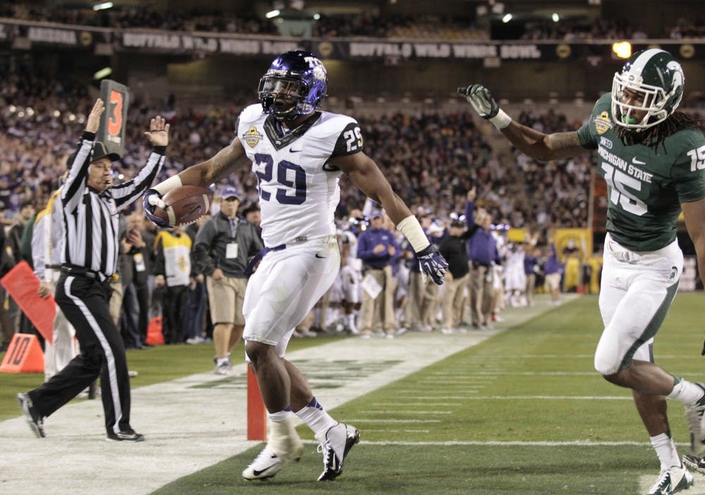 	<p>Texas Christian running back Matthew Tucker steps into the end zone after a 4-yard touchdown run in the first quarter against Michigan State in the Buffalo Wild Wings Bowl on Dec. 29, 2012, in Tempe, Arizona. Ron T. Ennis/Fort Worth Star-Telegram/MCT</p>