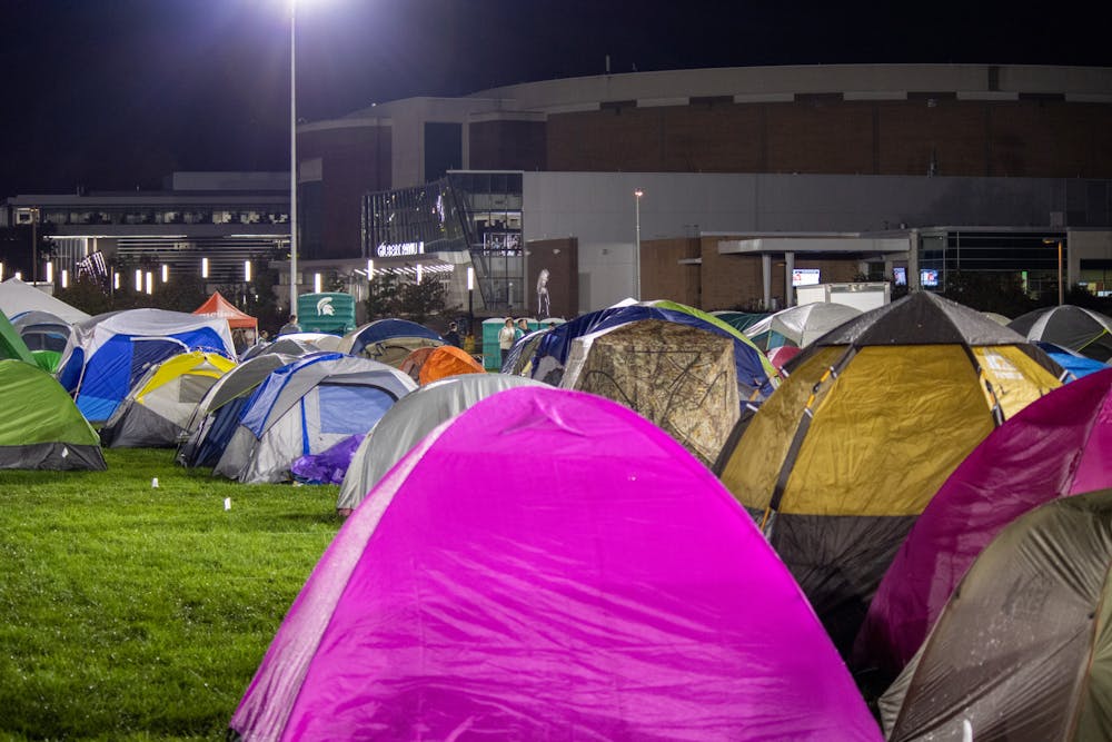 <p>Thousands of MSU students camped through rain or shine at the Izzone Campout held at Munn Field on Oct. 15, 2021.</p>