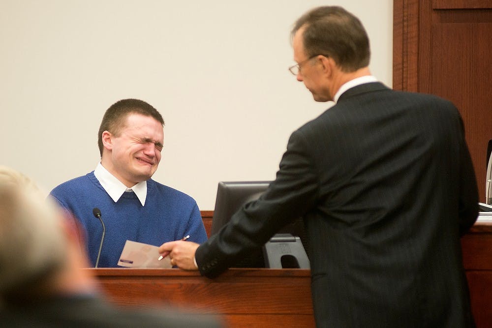 	<p>Alleged murderer Connor McCowan cries during his testimony after being shown a photo of Singler Oct. 10, 2013, at the Ingham County Circuit Court in Lansing. McCowan is accused of fatally stabbing <span class="caps">MSU</span> student Andrew Singler after getting in a fight with him over text messages Feb. 23. Julia Nagy/The State News</p>