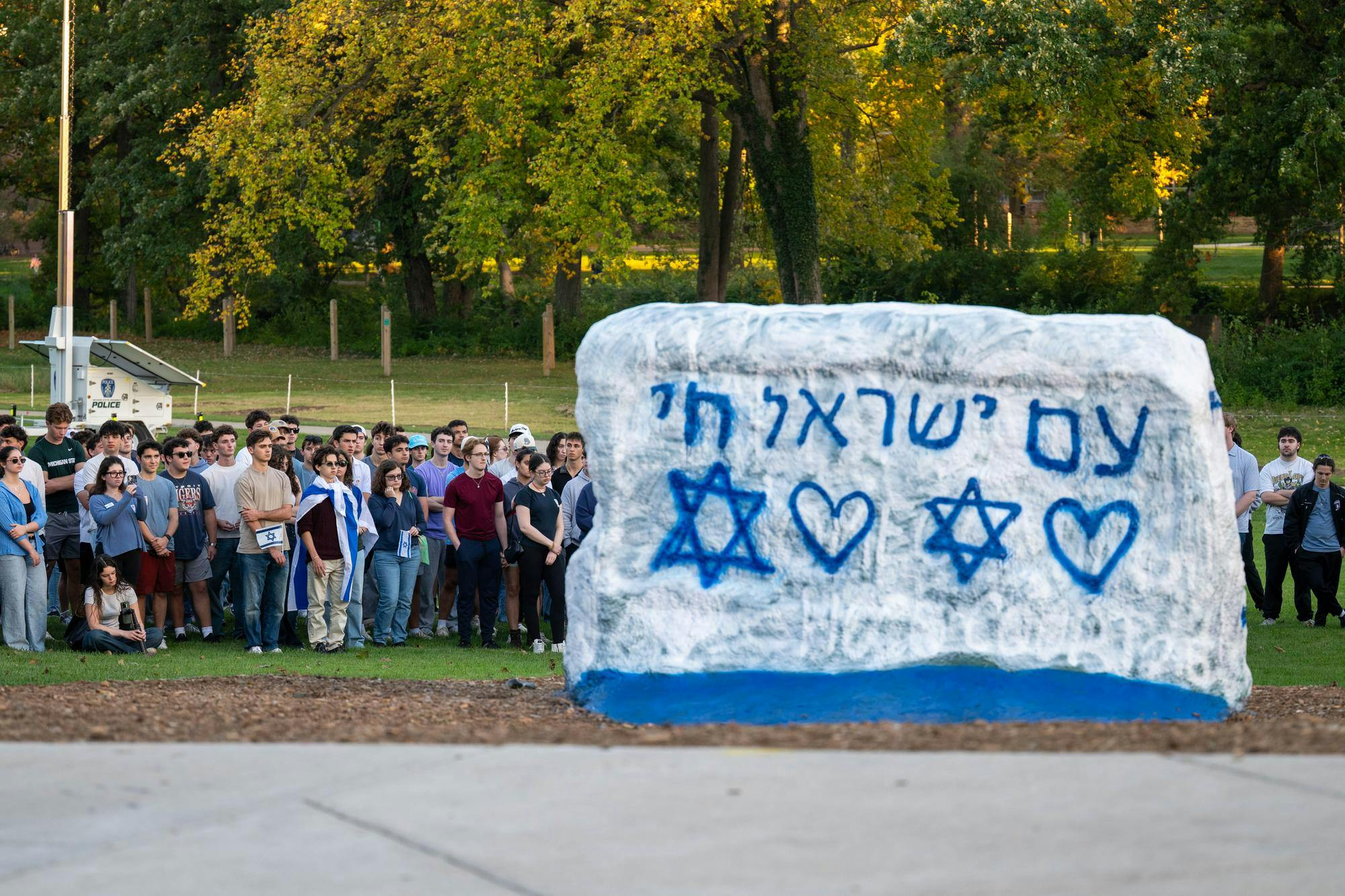 <p>Members of Spartans for Israel gather at The Rock on Michigan State University's campus during a vigil marking the third anniversary of the Oct. 7, 2023, Hamas-led attacks on Israel, in East Lansing, Mich., on Wednesday, Oct. 7, 2026, </p>