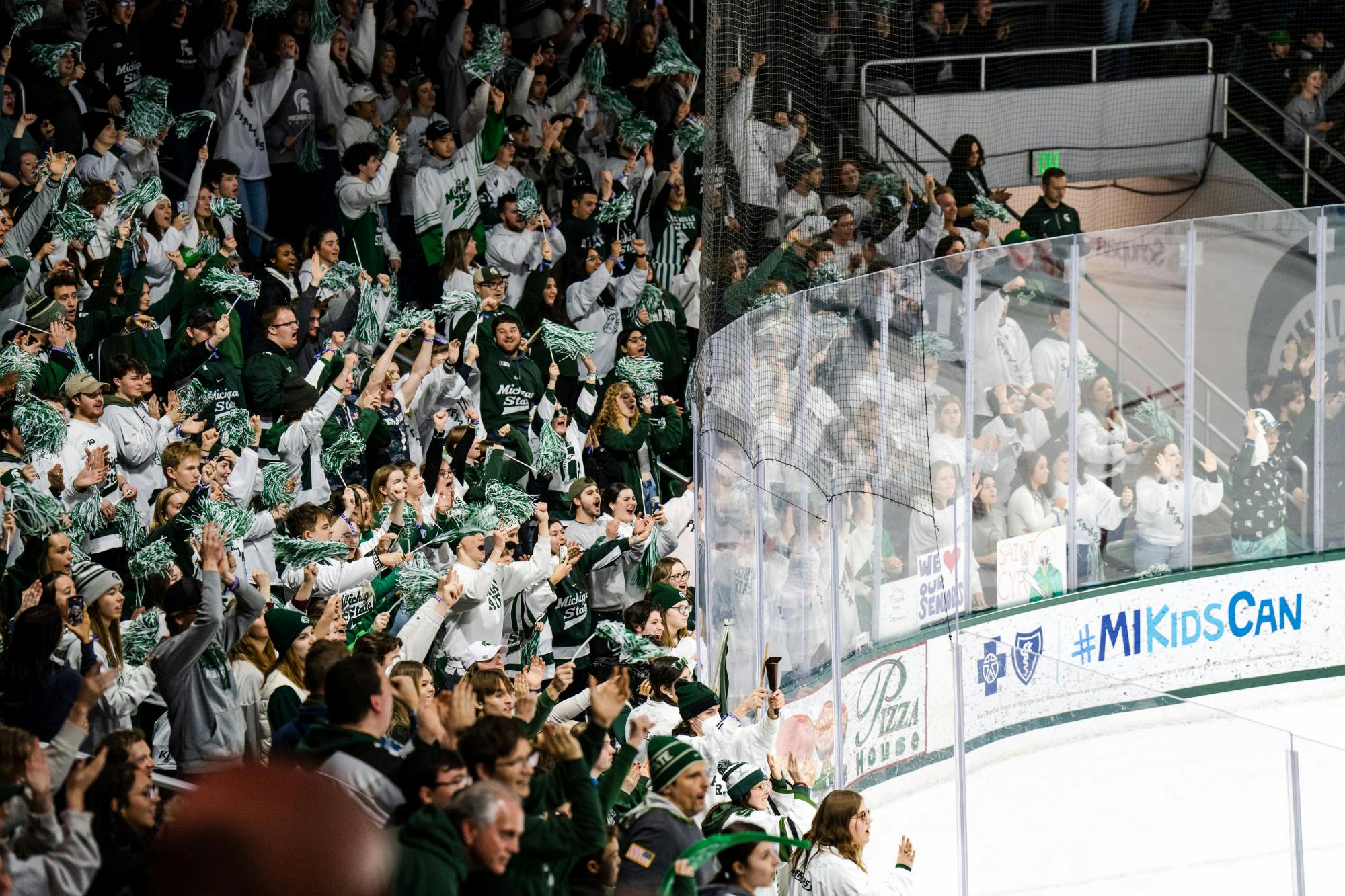 <p>The student section at Munn Ice Arena erupts in cheer as the clock runs out with MSU up 3-2 on Feb. 4, 2023.</p>