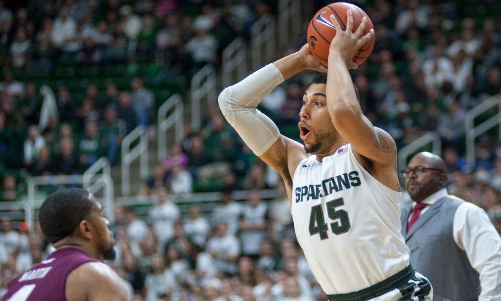 Senior guard Dezel Valentine looks to pass the ball during the first half of the men's basketball game against Maryland Eastern Shore on Dec. 5, 2015 at the Breslin Center. The Spartans defeated the Hawks, 78-35.
