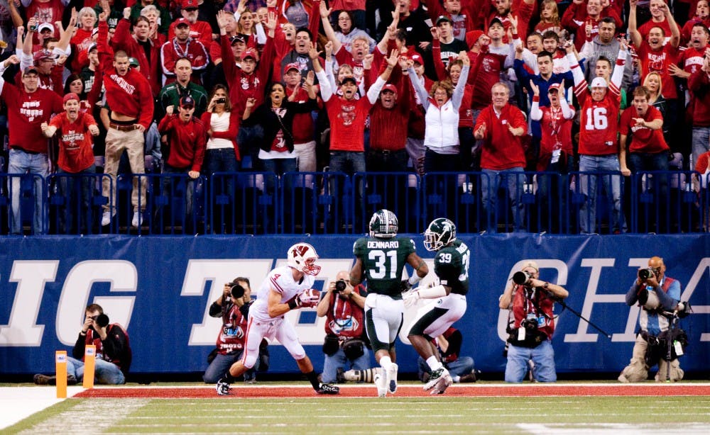 Wisconsin wide receiver Jared Abbrederis catches a touchdown pass. The Spartans lost to the Wisconsin Badgers, 42-39, in the Big Ten Championship game on Saturday night at Lucas Oil Stadium in Indianapolis, Ind. Josh Radtke/The State News