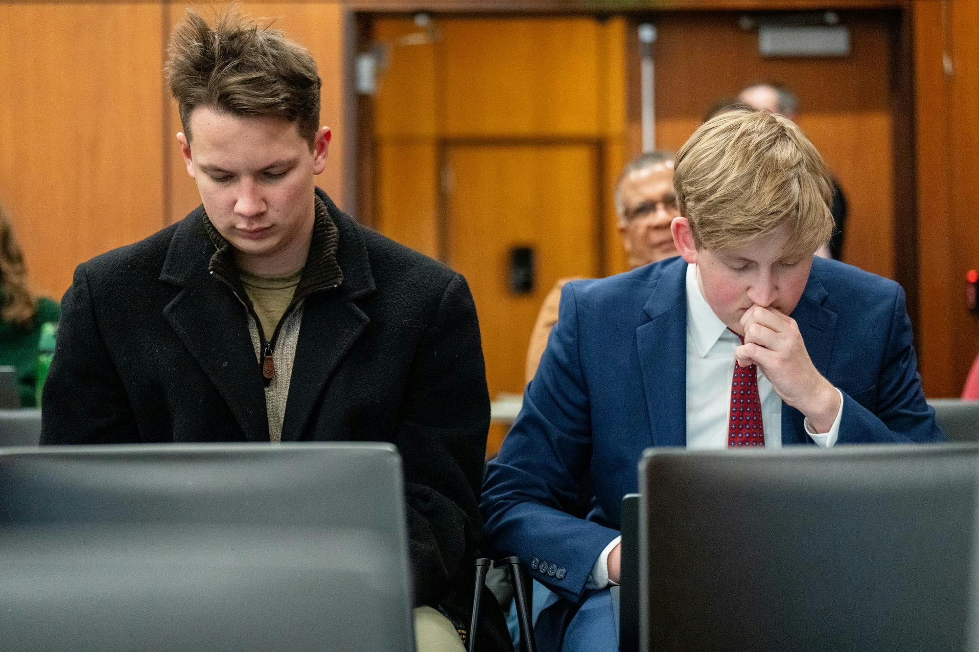 Michigan State University college republicans members seen during the MSU Board of Trustees at Hannah Administration Building in East Lansing, Michigan on Friday, Dec. 12, 2025. 