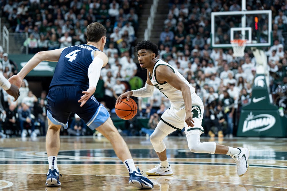 <p>Sophomore guard Jaden Akins (3) dribbles the ball during a game against Villanova at the Breslin Center on Nov. 18, 2022. The Spartans defeated the Wildcats 73-71. </p>