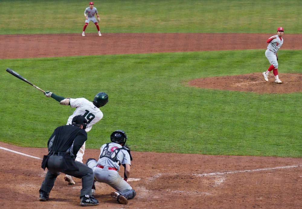 <p>Michigan State redshirt freshman Bryan Broecker nailing the ball at McLane Baseball Stadium, on March 30, 2022. Spartans are victorious 12-5 against Youngtown State.</p>