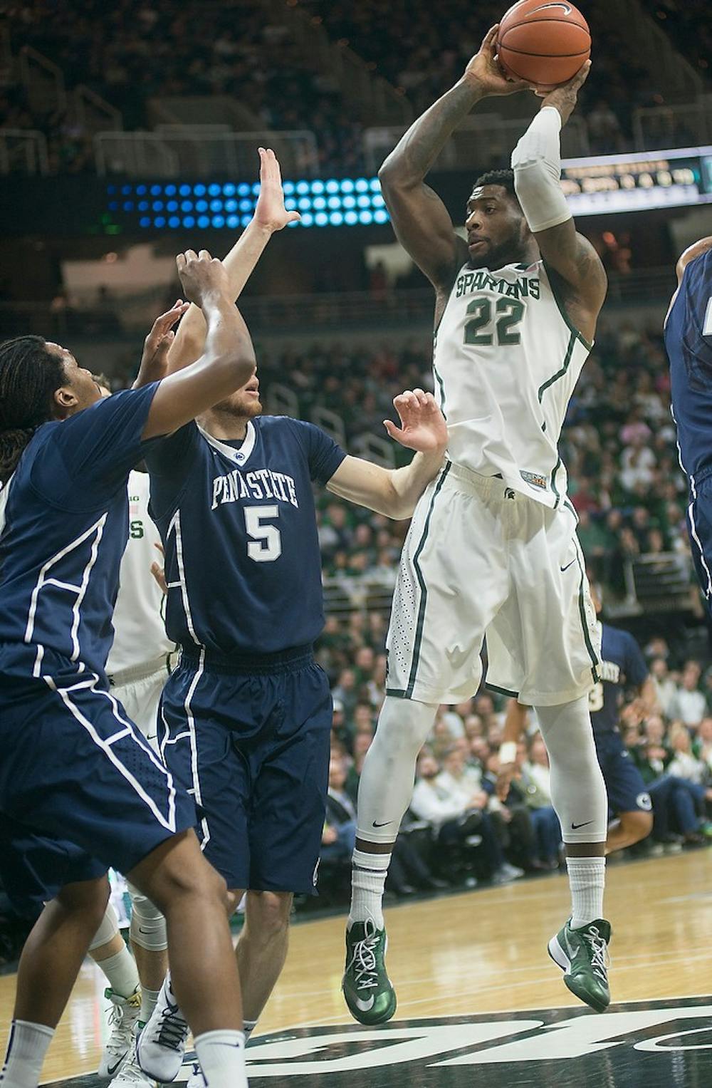<p>Senior forward Branden Dawson attempts to score two points for the Spartans during the game against Penn State on Jan. 21, 2015 at the Breslin Center. The Spartans defeated the Nittany Lions by 66-60 Wednesday night. Emily Nagle/The State News</p>