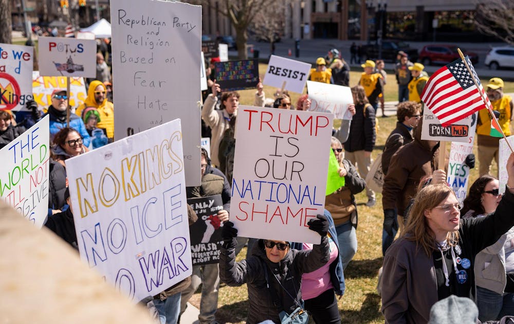 <p>Protestors march and chant together during the No Kings Protest at the Michigan State Capitol in Lansing, MI on March 28, 2026.</p>