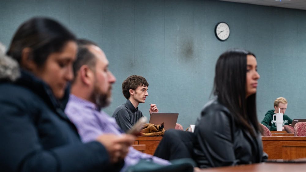 <p>Christian Allmand, Broad College of Business representative introduces bill about advocating to keep the ducks on campus at the Associated Students of Michigan State University's last General Assembly meeting of the year on Dec. 5, 2024 at International Center.</p>