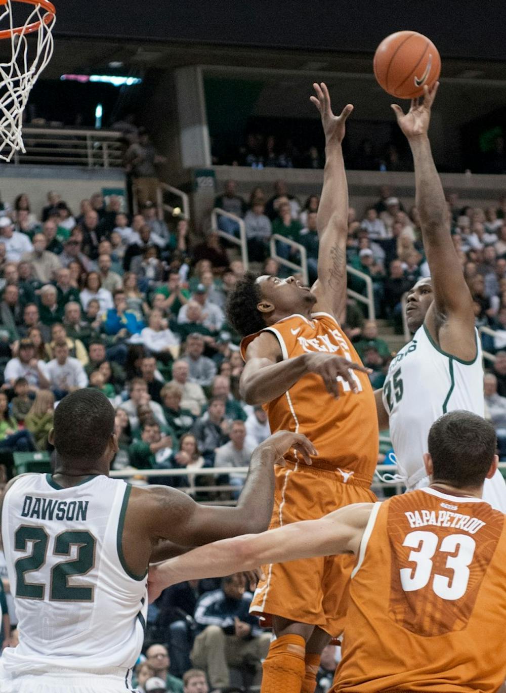 	<p>Senior center Derrick Nix goes to shoot the ball during the game against Texas on Dec. 22, 2012, at Breslin Center. Nix had a career high 25 points and 11 rebounds in the game, helping the Spartans beat the Longhorns 67-56. Natalie Kolb/The State News</p>