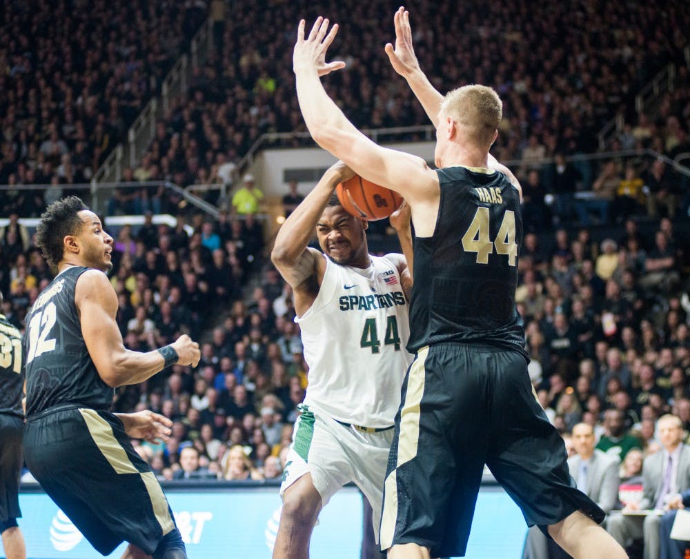 Freshman forward Nick Ward (44) drives the ball to the net in the second half of the men's basketball game against Purdue on Feb. 18, 2017 at Mackey Arena in Lafayette, Ind. The Spartans were defeated by the Purdue boilermakers, 80-63.