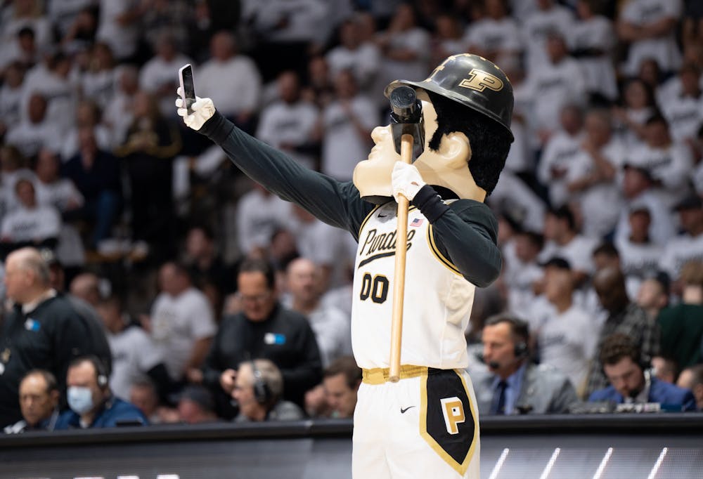 <p>The Boilermaker Special, Purdue's mascot, takes a selfie with the student section during a game against MSU at Mackey Arena on Jan. 29, 2023. The Spartans lost to the Boilermakers 77-61.</p>