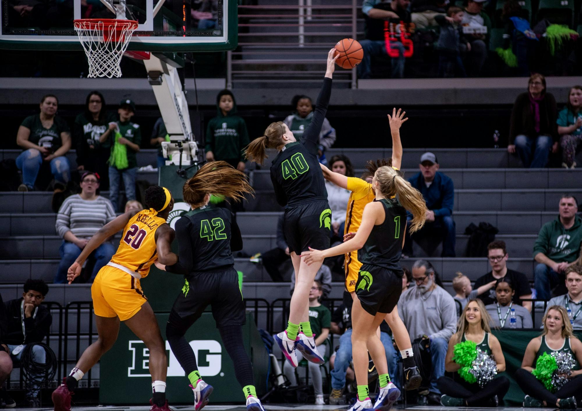 Freshman guard Julia Ayrault (40) swats away a shot during the game against Minnesota Feb. 17, 2020 at the Breslin Center.