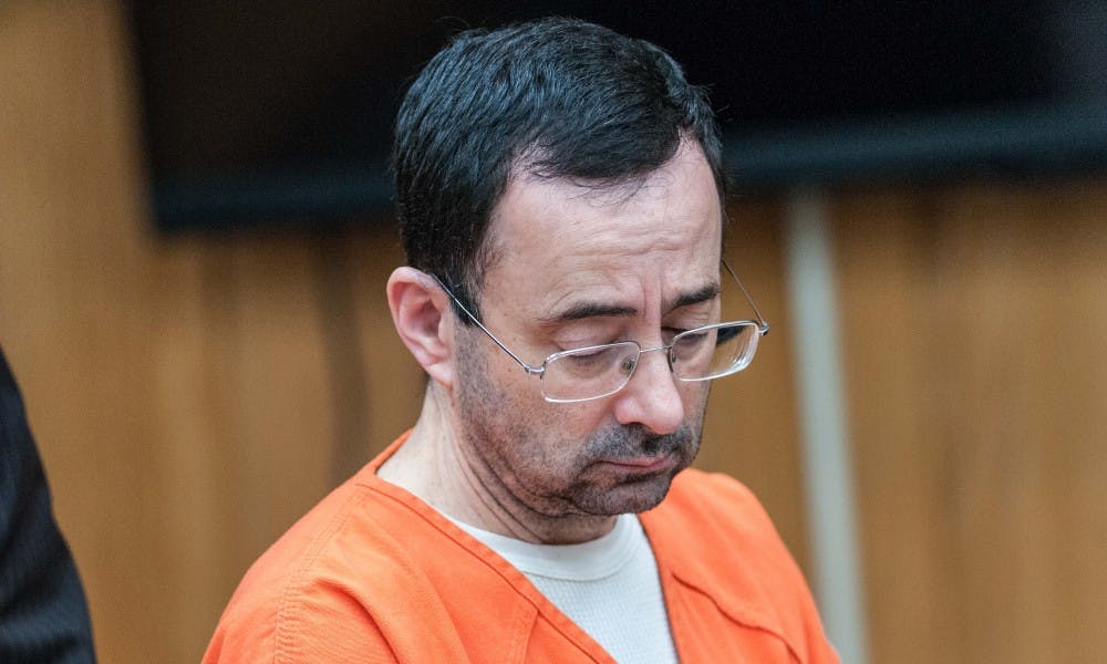 Larry Nassar listens to the judge during the plea hearing on Nov. 29, 2017, at the Eaton County Friend of Court. Nassar pleaded guilty to three counts.