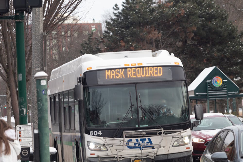 CATA bus on Grand River Ave. displaying "Mask Required" on Jan. 20, 2021.