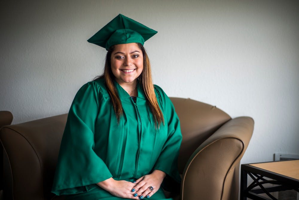 <p>Advertising senior Raquel Izzo poses for a photo on April 26, 2017 at Campus Village Apartments at 1151 East Michigan Ave in East Lansing. Izzo will be graduating with the rest of her class on May 5.</p>