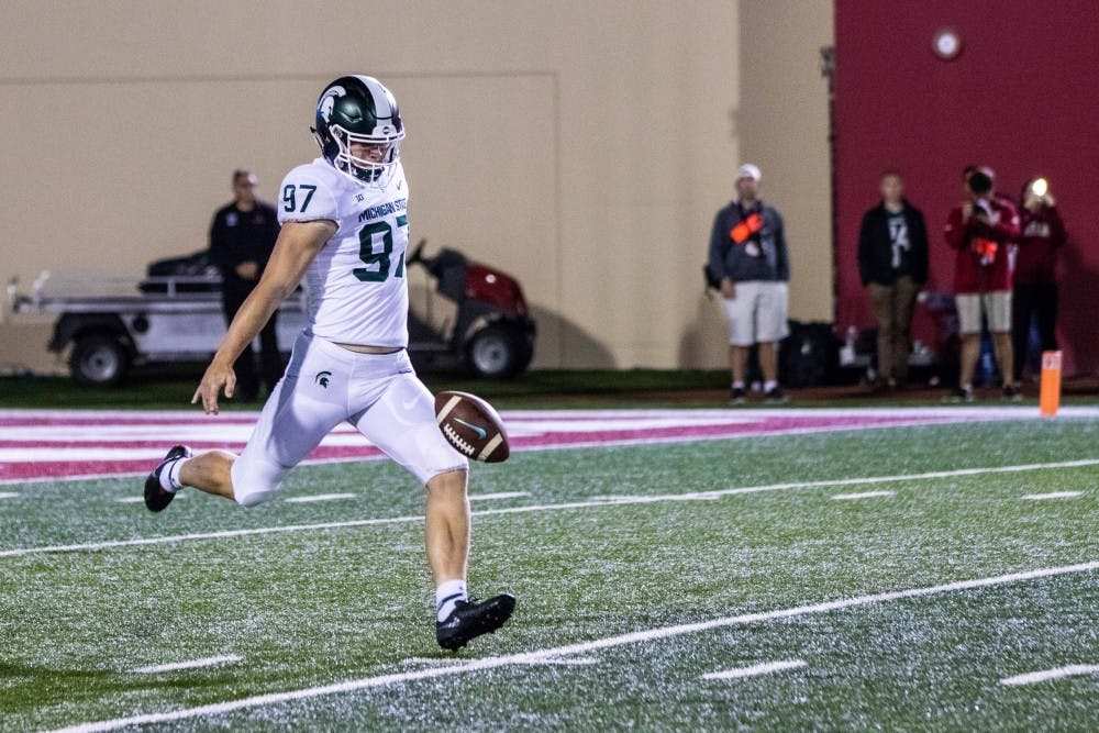 <p>Redshirt freshman kicker Tyler Hunt (97) punts during the game against Indiana on Sept. 22, 2018 at Memorial Stadium. The Spartans defeated the Hoosiers, 35-21.</p>