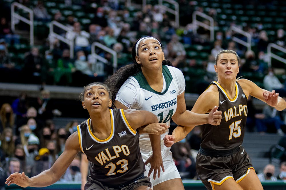 <p>Junior forward Taiyier Parks gets boxed-out at the Breslin Center on Nov. 16, 2021. Michigan State women&#x27;s basketball took down Valparaiso 73-62, as Head Coach Suzy Merchant claimed her 500th win.</p>