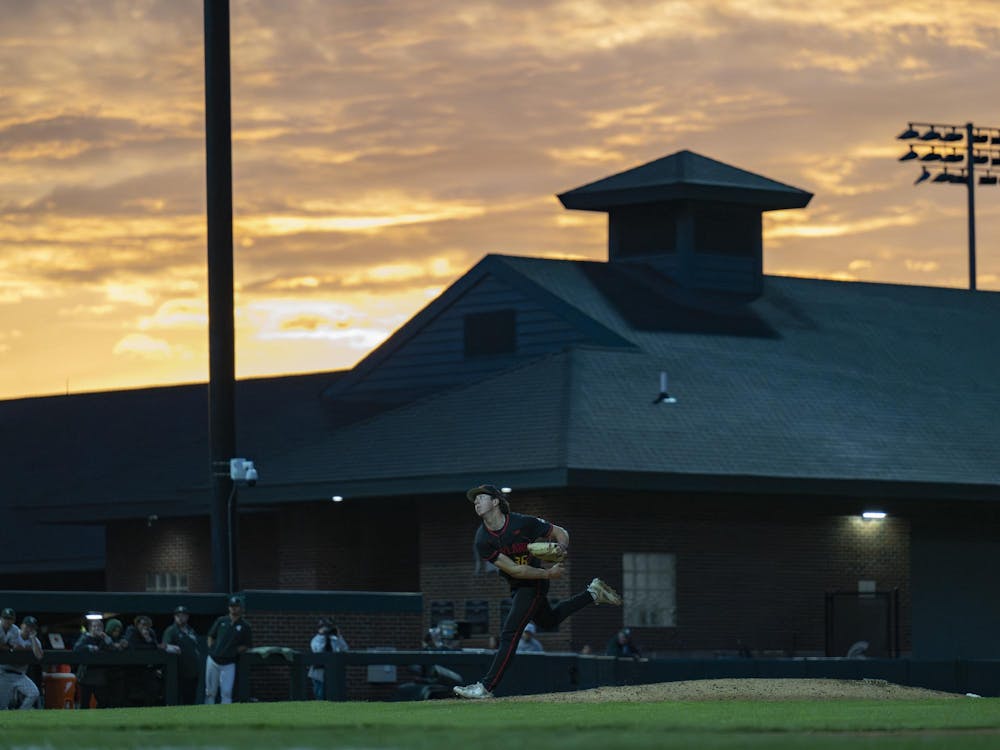 <p>MSU sophomore Logan Hastings pitches the ball at sunset at Jeff Ishbia Field at McLane Baseball Stadium in East Lansing, Mich., on Friday, April 24, 2026. </p>