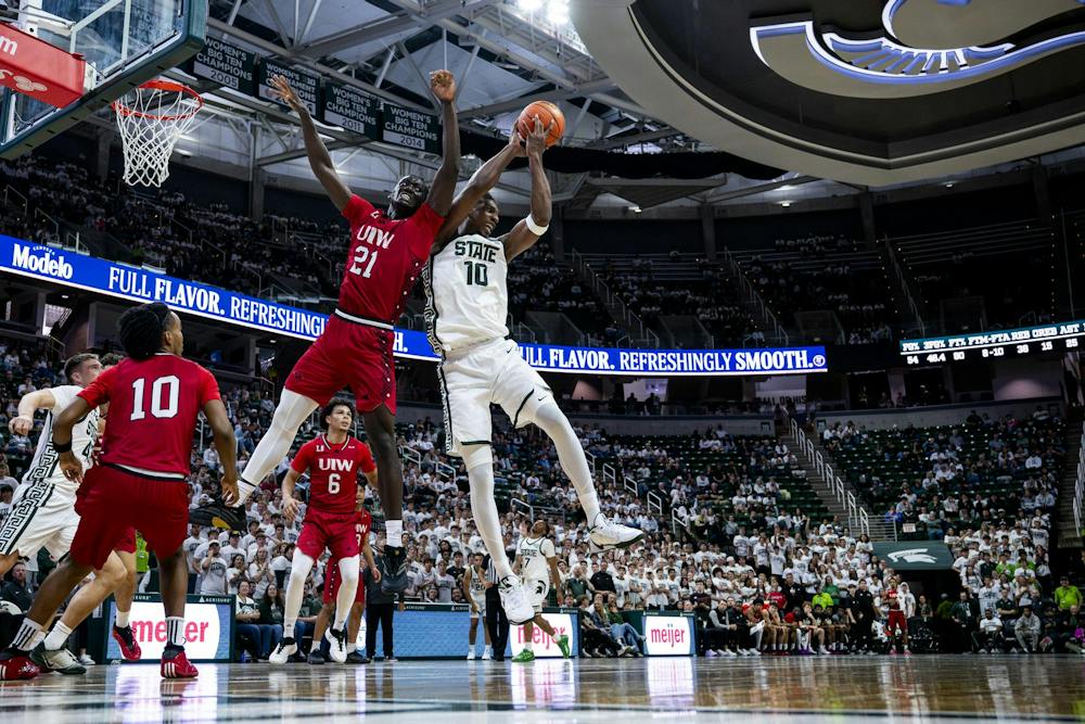 <p>Incarnate Word forward Godswill Erherine (21) guards Michigan State center Ethan Taylor (10) during the Michigan State vs. Incarnate Word men's basketball exhibition game at Breslin Center in East Lansing, Mich., on Friday, Oct. 2, 2026.</p>
