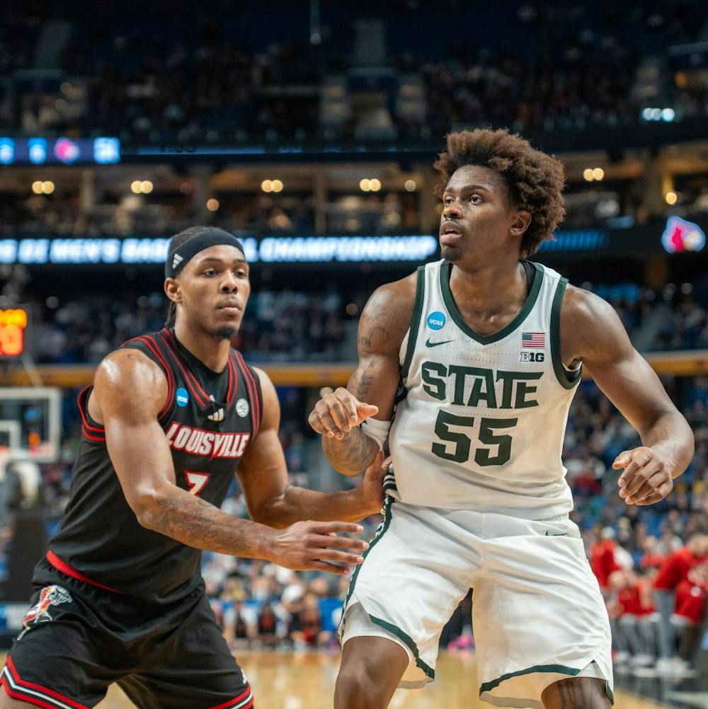 Junior forward Coen Carr (55) prepares for the ball during the March Madness matchup against University of Louisville at the KeyBank Center in Buffalo, New York on March 21, 2026.