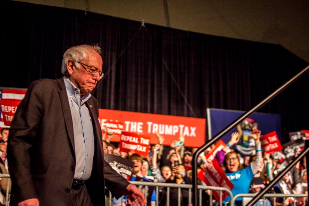 <p><br></p>
<p><br></p>
<p>U.S. Senator Bernie Sanders enters the rally on Feb. 25, 2018 at the Lansing Center Hall. The rally brought together Sander supporters and community members calling for the repeal of the GOP tax bill.&nbsp;</p>