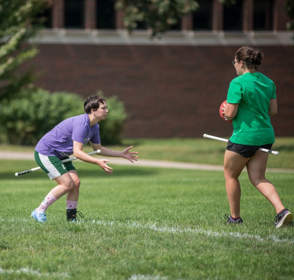 Advertising senior Miranda Tolsma prepares herself to catch the ball during the second Quidditch practice of the year on Sep. 2, 2018 at IM East.