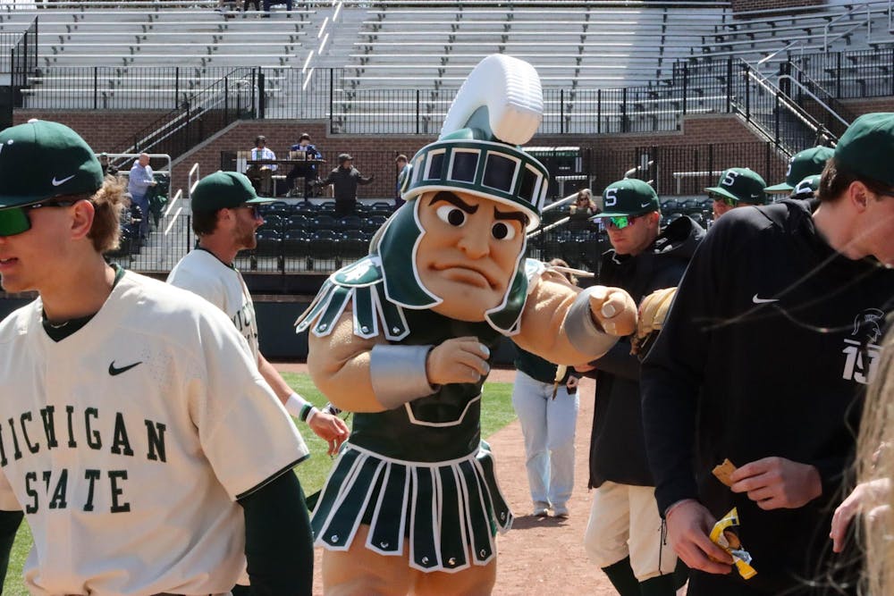 <p>Fan favorite mascot Sparty jokes around with the MSU Baseball team in the dugout at the matchup against Penn State at McLane Baseball Stadium on April 21, 2024.</p>