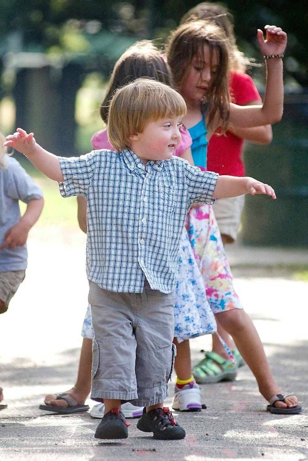 	<p>Charlie Waller, 3, leads friends in a game of hopscotch Wednesday evening at Patriarche Park. The Waller family held a barbecue July 20, 2011 to thank those who have helped them in Charlie&#8217;s battle against Diffuse Intrinsic Pontine Glioma, or <span class="caps">DIPG</span>, a rare form of brain cancer. Matt Radick/The State News</p>