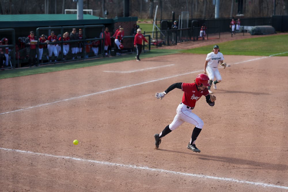 <p>Nebraska sophomore Billie Andrews running all the way to second base after hitting it down right field in the fifth inning. Spartans lost 5-4 against Nebraska, on April 10, 2022.</p>