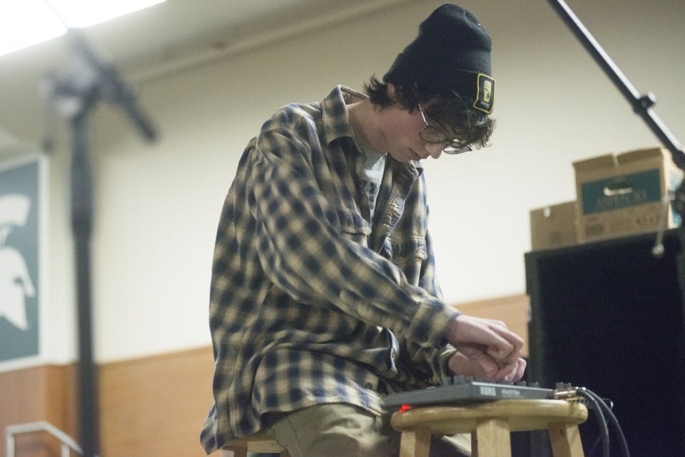 Interdisciplinary studies in social science freshman Cameron McGuffie performs during the UAB open mic night on Feb. 16, 2016 at the Union. McGuffie makes his own electronic music.