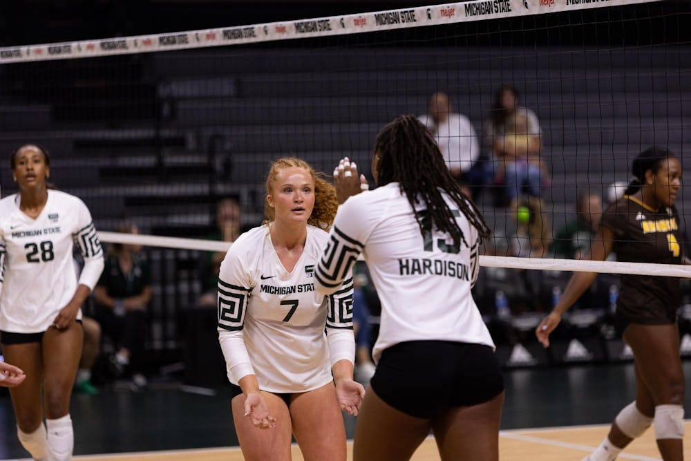 <p>Michigan State redshirt sophomore Malayah Long (7) and senior middle blocker Zora Hardison (15) celebrate a point during the Michigan State vs Western Michigan volleyball game at the Breslin Center on Tuesday, Sept. 8, 2026.</p>