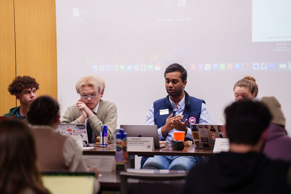 ASMSU Vice President for Finance and Operations Vipul Adusumilli responds to discussion by the General Assembly regarding renewing the Safe Ride tax during a General Assembly meeting, held at the Student Services building on Feb. 2, 2023.