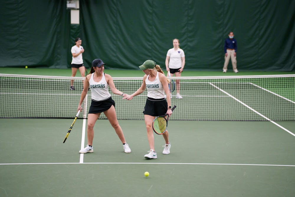 <p>Sophomore Ayshe Can and Senior Nicole Stephens celebrating a big point against the DePaul Blue Devils. Taken on January 30, 2022. Spartans won against DePaul<br/>University, with the final score of 5 - 2.</p><p><br/></p>