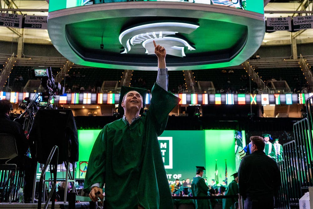 <p>A graduate celebrates after the ceremony during the Michigan State University College of Communication Arts and Sciences graduation ceremony at the Breslin Student Events Center on Michigan State University’s campus in East Lansing, Mich., on Friday, May 1, 2026.</p>