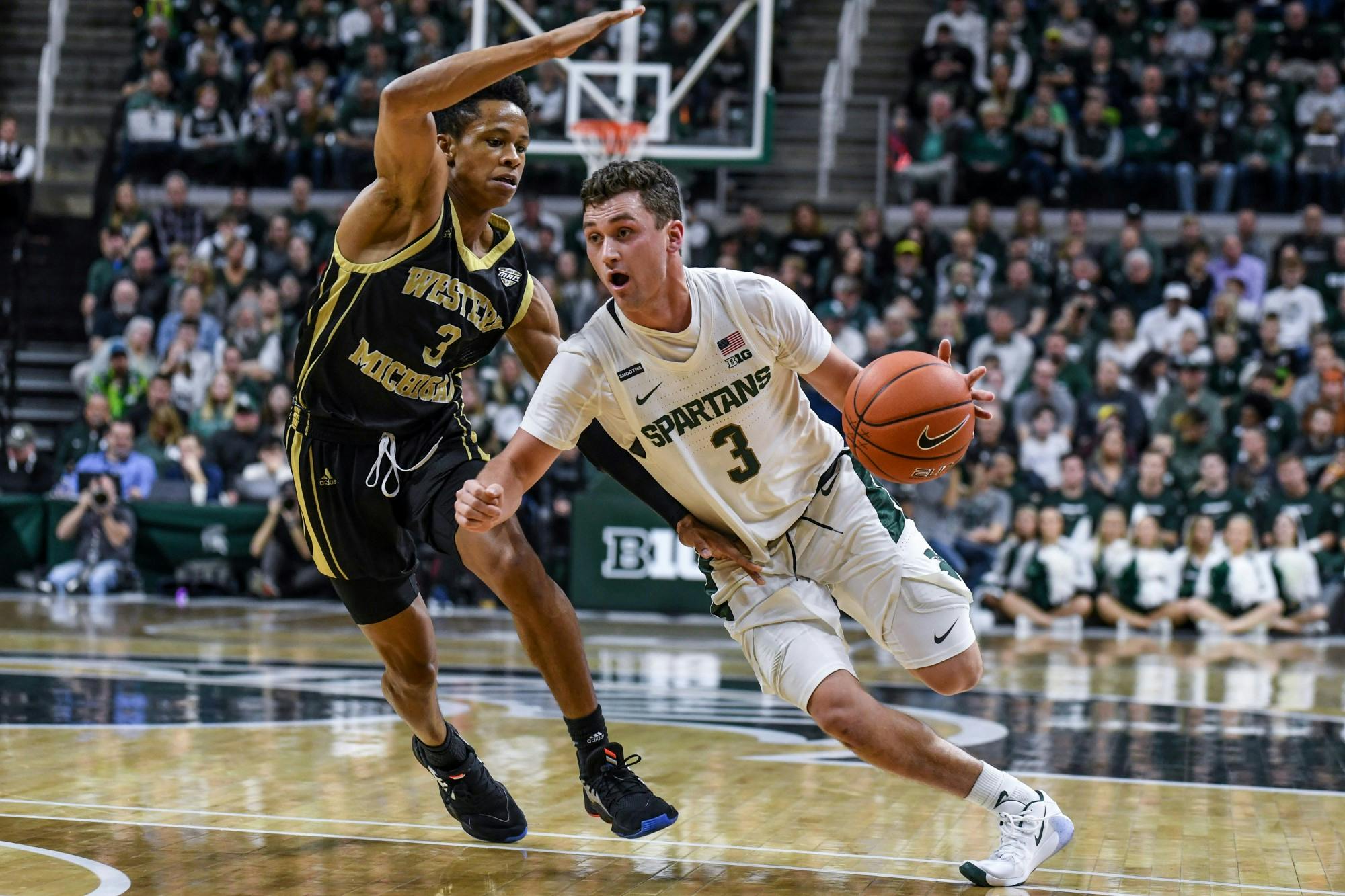 <p>Then-sophomore guard Foster Loyer (3) drives into the lane during the game against Western Michigan on Dec. 29, 2019, at the Breslin Center. The Spartans defeated the Broncos, 95-62.</p>