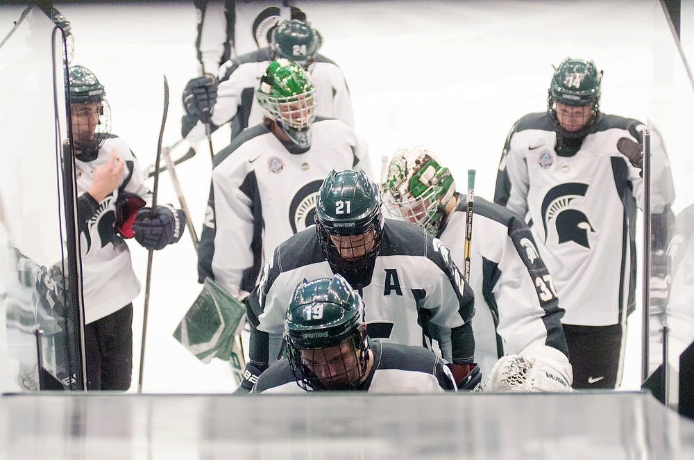 	<p><span class="caps">MSU</span> team members skate off the ice after the end of the exhibition game against the U.S. National Team Development Program on Tuesday, Jan. 22, 2013, at Munn Ice Arena. The U.S. <span class="caps">NTDP</span> defeated the Spartans 3-0. Danyelle Morrow/The State News</p>