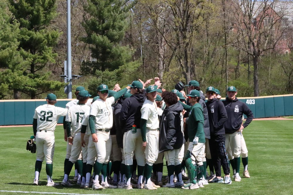 <p>The MSU Baseball team gathers in a huddle starting off the game against Penn State at McLane Baseball Stadium on April 21, 2024.</p>