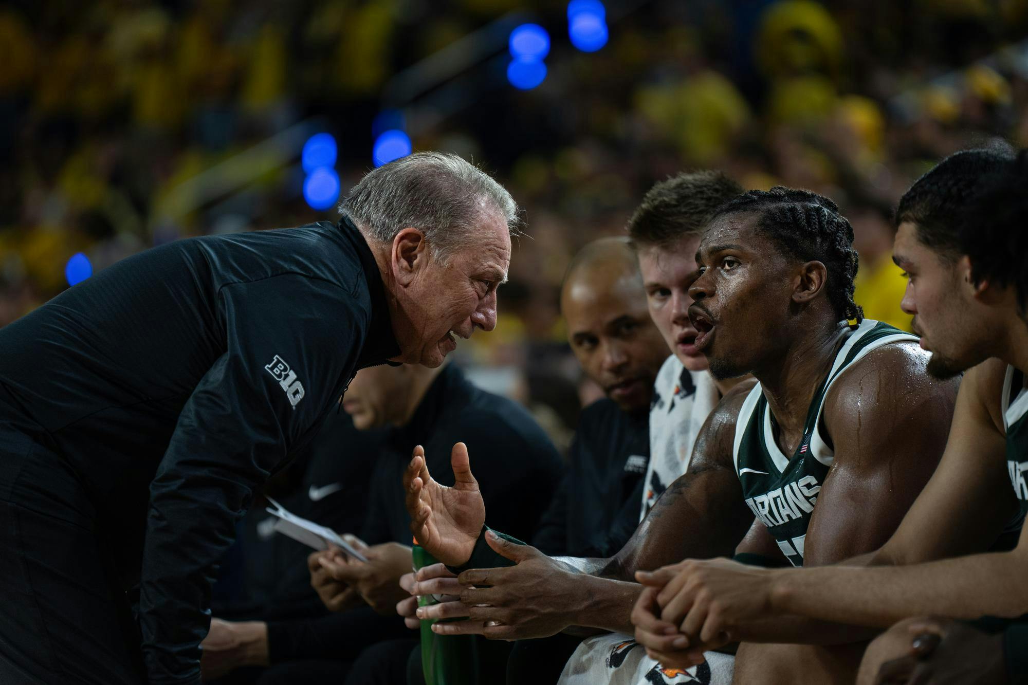 <p>MSU men's basketball Head Coach Tom Izzo talks to MSU forward Coen Carr (55) during their matchup against the Michigan Wolverines at the Crisler Center in Ann Arbor, Michigan, on Sunday, March 8, 2026.</p>