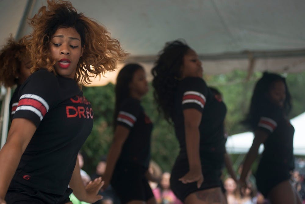 <p>The Urban Dreams dance team performs during Spartan Remix on Sept. 10, 2015 at Auditorium Field. The team specializes in hip hop and street dancing and currently has 17 active members. Alice Kole/The State News</p>