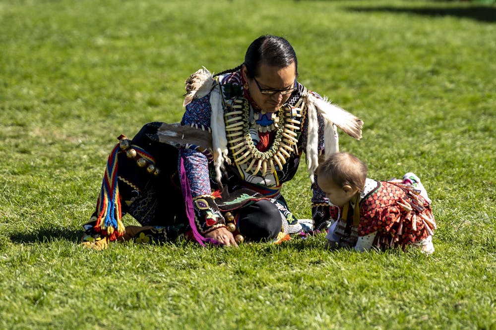 People participate in the Tiny Tots Exhibition during the Pow Wow of Love at the IM East Field on Oct. 1, 2022. Dance exhibitions and specials occurred and the area was full of art and food vendors.