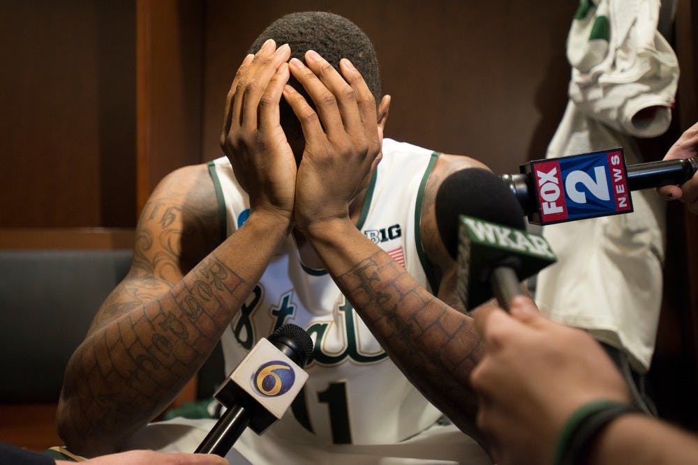 <p>Senior guard Keith Appling gets emotional after the game against Connecticut on March 30, 2014, at Madison Square Garden in New York City. The Spartans lost in the Elite Eight, 60-54. Julia Nagy/The State News</p>