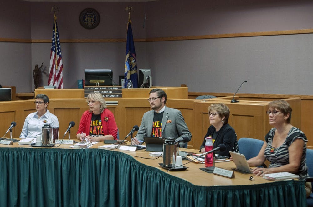 <p>The East Lansing City Council members discuss issues at the August 4 meeting inside East Lansing City Hall on August 4, 2015. Joshua Abraham/The State News</p>