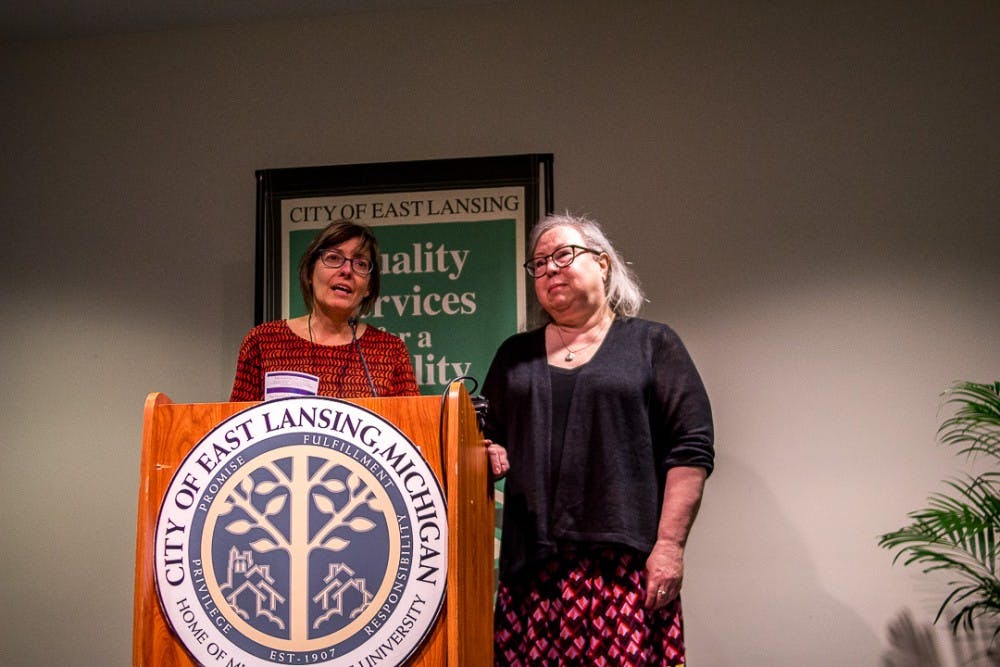 East Lansing residents, Alice Dreger and Ann Nichols of ELi media group give their acceptance speech during the Crystal Awards Reception on April 19, 2018 at the East Lansing Hannah Community Center. 